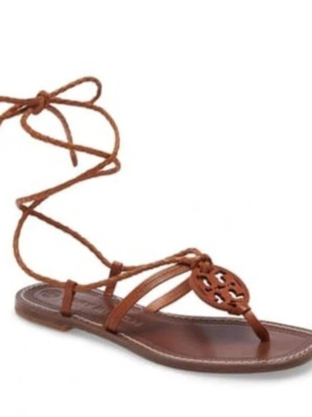 The Tory Burch Miller Braided Ankle-Wrap Sandal is a stylish flat sandal featuri